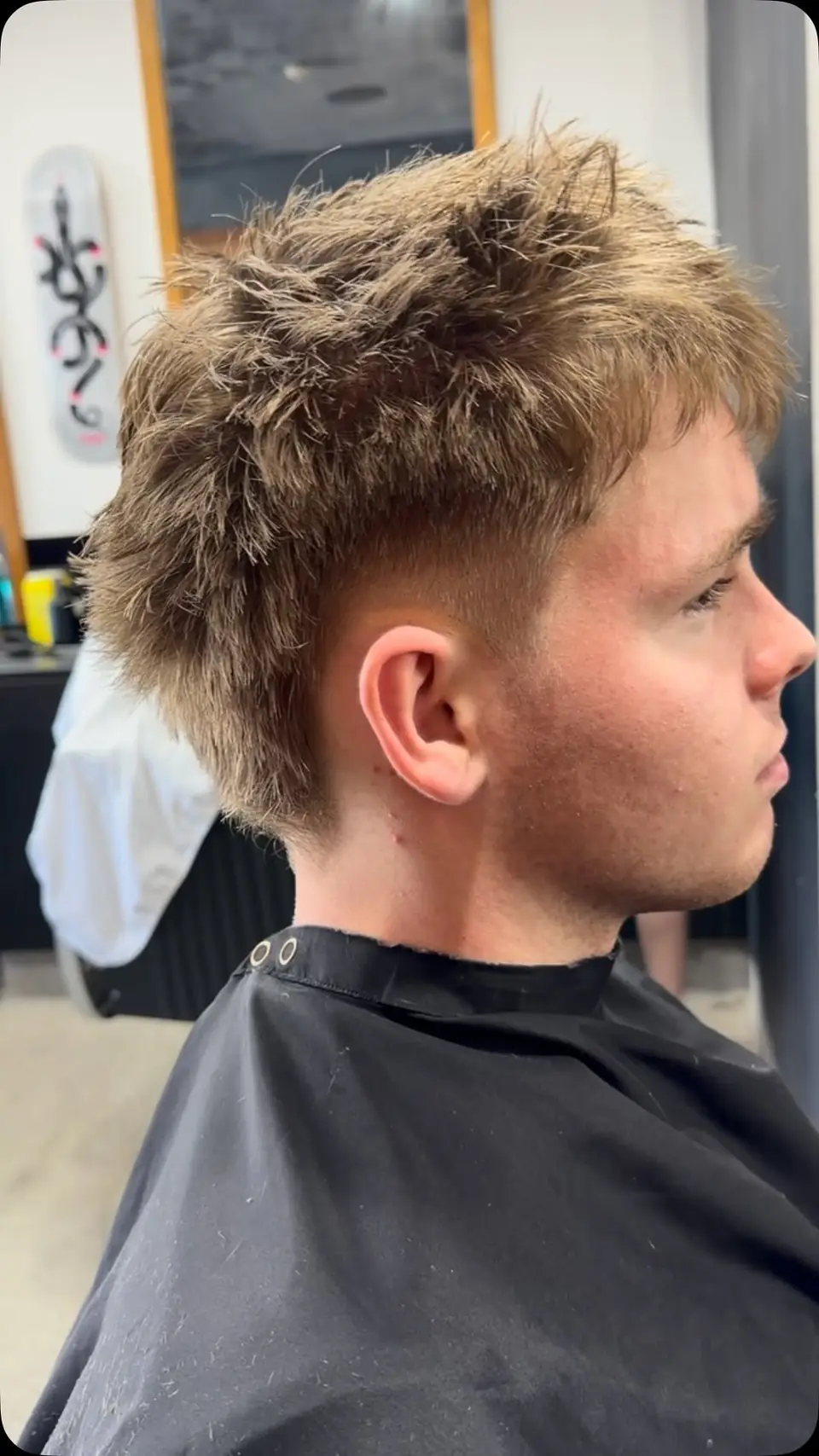 Textured burst-fade mullet, fresh off the chair