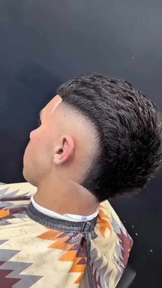 Back view of a burst-fade mullet